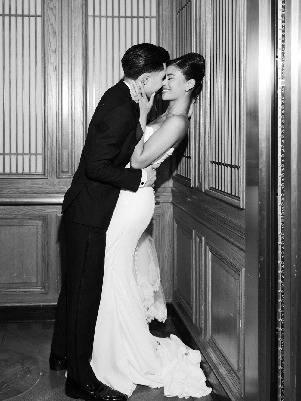 Couple sharing a quiet black and white kiss